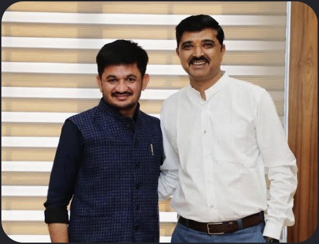 Hardikbhai Tamaliya with another leader